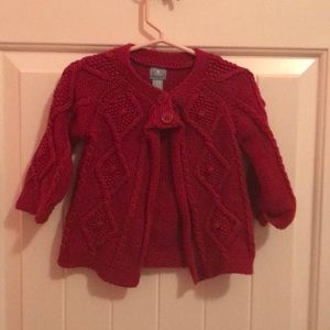 Red cable knit sweater NWOT.